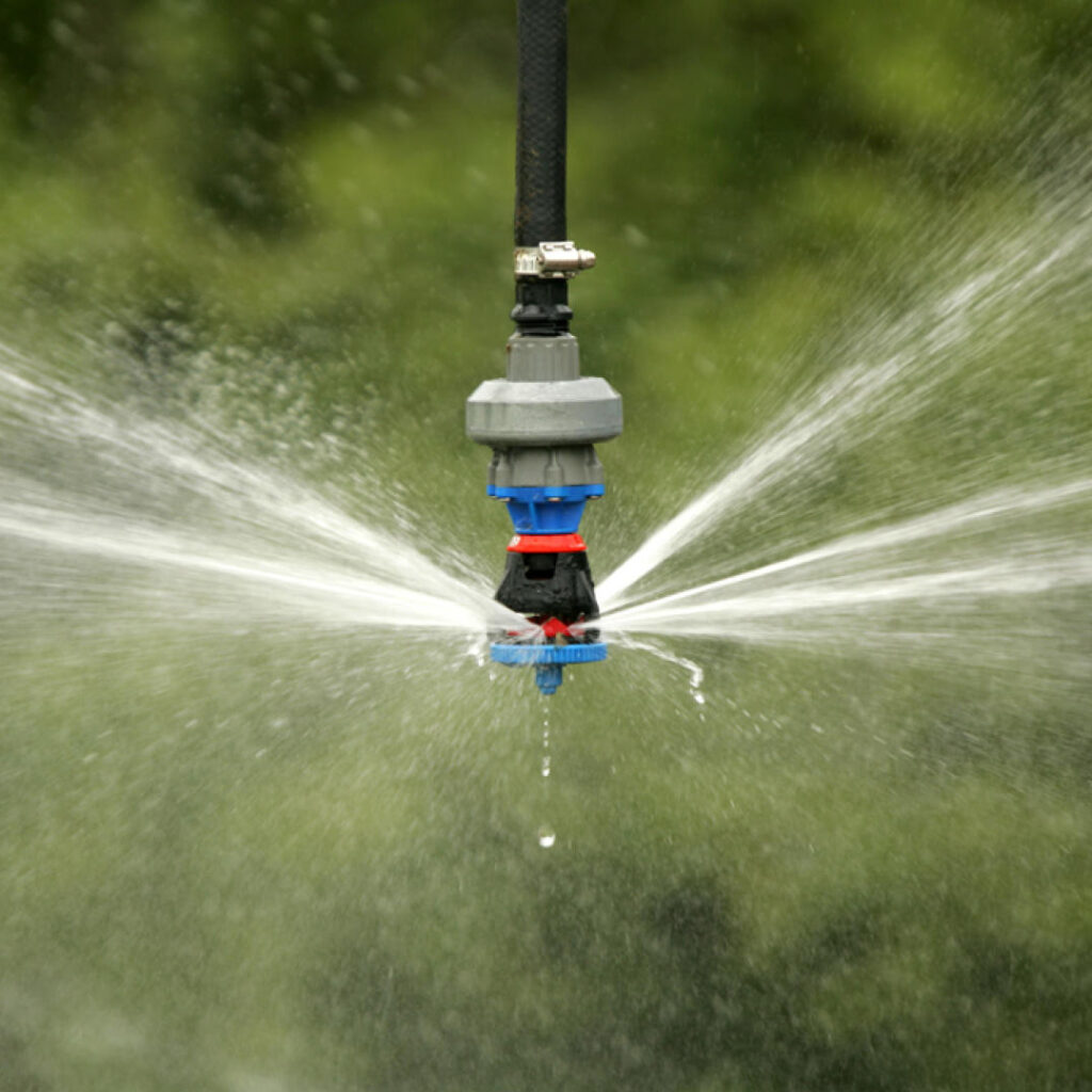 Nelson Sprinkler Head with Water Spraying